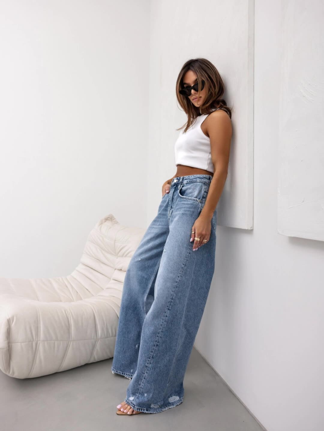 American vintage distressed denim pants, wide silhouette